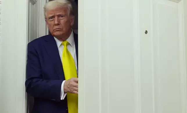 President Donald Trump arrives at a swearing in ceremony for Dr. Mehmet Oz to be Administrator of the Centers for Medicare and Medicaid Services, in the Oval Office of the White House, Friday, April 18, 2025, in Washington. (AP Photo/Alex Brandon)