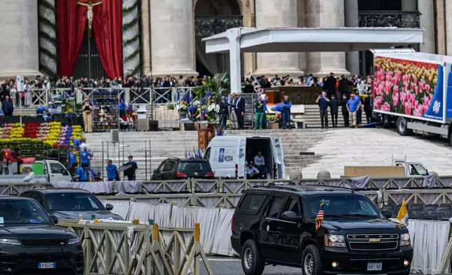 The motorcade of U.S. Vice President JD Vance departs the Vatican after Vance met with Cardinal Pietro Parolin and Archbishop Paul Gallagher, Saturday, April 19, 2025. (Kenny Holston/Pool Photo via AP)