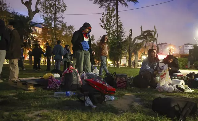 Locals camp in a public park following an earthquake shock with a preliminary magnitude of 6.2, in Istanbul, Turkey, Wednesday, April 23, 2025. (Berkman Ulutin/Dia Photo via AP)