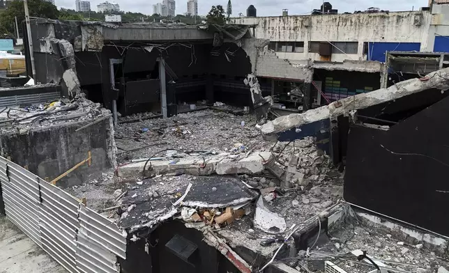 A view of the Jet Set nightclub days after its roof collapsed, killing more than 200 people, in Santo Domingo, Dominican Republic, Friday, April 11, 2025. (AP Photo/Matias Delacroix)