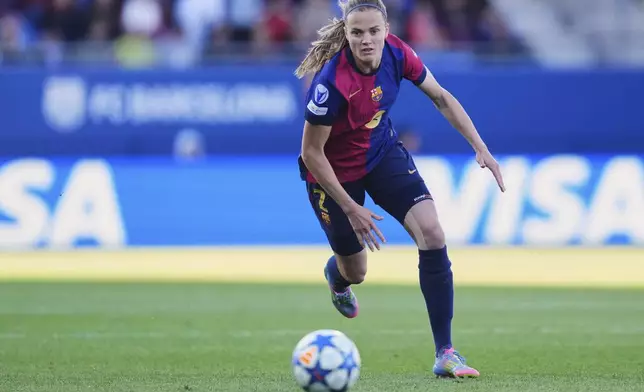 Barcelona's Irene Paredes runs after the ball during the women's Champions League semifinals, first leg, soccer match between FC Barcelona and Chelsea FC at the Johan Cruyff Stadium, in Sant Joan Despi, outside Barcelona, Spain, Sunday, April 20, 2025. (AP Photo/Bagu Blanco)