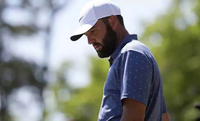 Scottie Scheffler prepares to hit from the seventh tee during the third round of the RBC Heritage golf tournament, Saturday, April 19, 2025, in Hilton Head Island, S.C. (AP Photo/Mike Stewart)