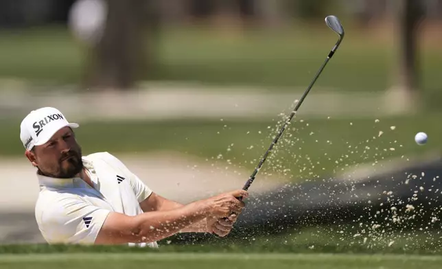 Andrew Novak hits from the second hole during the third round of the RBC Heritage golf tournament, Saturday, April 19, 2025, in Hilton Head Island, S.C. (AP Photo/Mike Stewart)