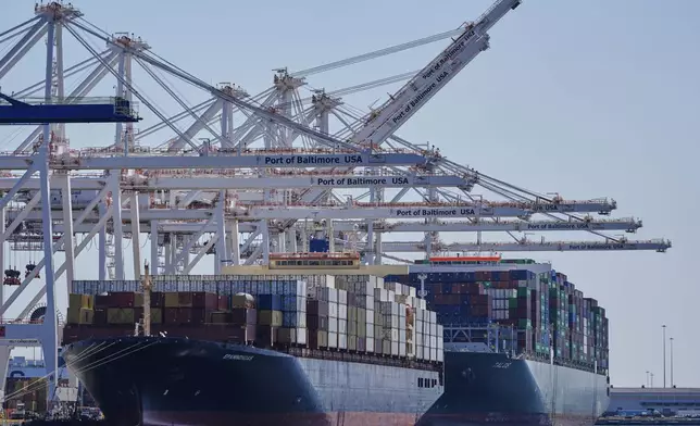Container ships Epaminondas and Talos are docked at the Port of Baltimore, Wednesday, April 9, 2025, in Baltimore. (AP Photo/Stephanie Scarbrough)