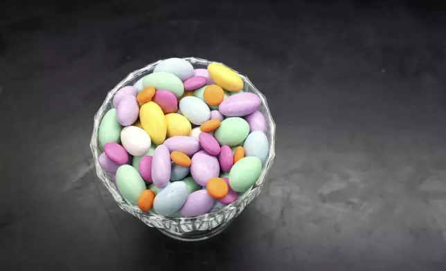 Candy using food coloring are displayed in a lab at Sensient Technologies Corp., a color additive manufacturing company, in St. Louis., on Wednesday, April 2, 2025. (AP Photo/Jeff Roberson)