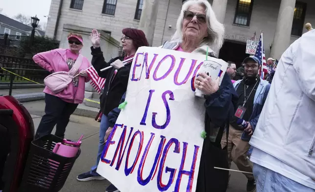 Supporters of Karen Read gather on the steps at Norfolk Superior Court prior to Read's trial, Tuesday, April 22, 2025, in Dedham, Mass. (AP Photo/Charles Krupa)