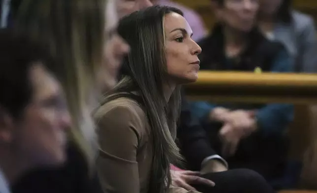 Karen Read listens to testimony during her trial, Thursday, April 24, 2025, at Norfolk Superior Court in Dedham, Mass. (AP Photo/Charles Krupa, Pool)
