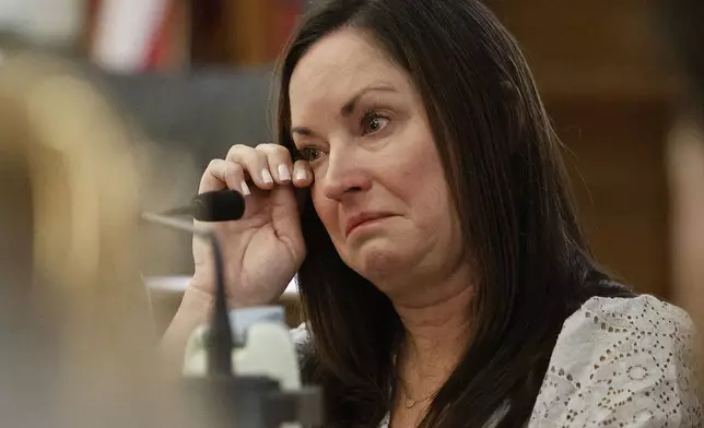 Witness Kerry Roberts emotionally describes the injuries to John O'Keefe she saw in the hospital during the Karen Read trial in Norfolk Superior Court at Dedham, Mass., on Wednesday, April 23, 2025 (Greg Derr/The Patriot Ledger via AP, Pool)