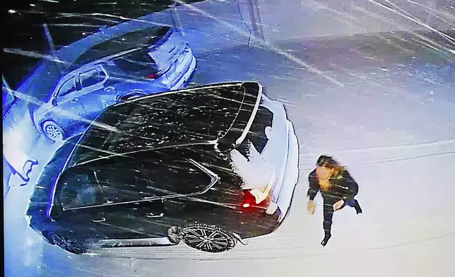 A video from a "Ring" camera at John O'Keefe's home, Karen Read is seen arriving in her SUV to look for O'Keefe with Kerry Roberts and Jennifer McCabe is shown during Read's trial in Norfolk Superior Court at Dedham, Mass., on Wednesday, April 23, 2025 (Greg Derr/The Patriot Ledger via AP, Pool)