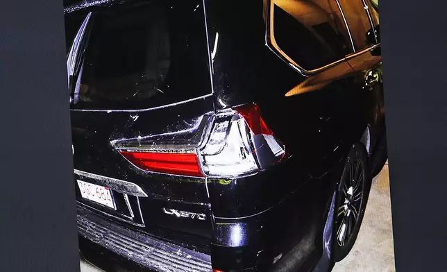 An image of Karen Read's SUV with a damaged taillight which was put into evidence is shown during the Karen Read trial in Norfolk Superior Court at Dedham, Mass., on Wednesday, April 23, 2025 (Greg Derr/The Patriot Ledger via AP, Pool)