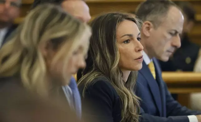 Karen Read listens to the testimony of Kerry Roberts during her trial at Norfolk Superior Court at Dedham, Mass., on Wednesday, April 23, 2025 (Greg Derr/The Patriot Ledger via AP, Pool)