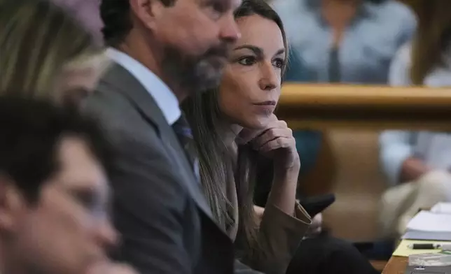 Karen Read listens to testimony during her trial, Thursday, April 24, 2025, at Norfolk Superior Court in Dedham, Mass. (AP Photo/Charles Krupa, Pool)
