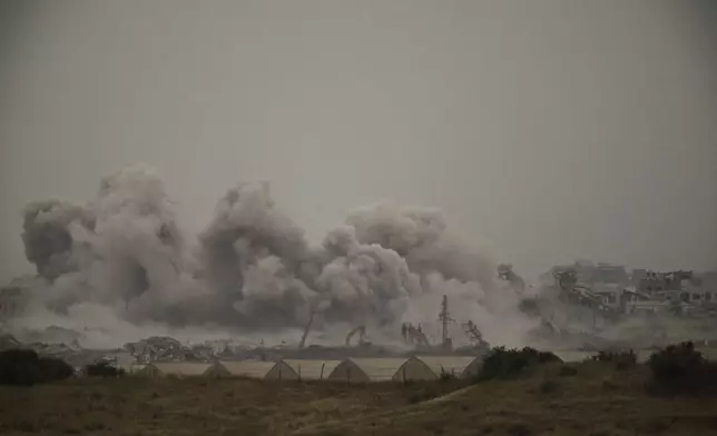 Smoke rises to the sky following an Israeli bombardment in the Gaza Strip as seen from southern Israel, Monday, April 7, 2025. (AP Photo/Leo Correa)