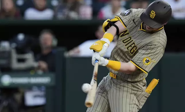 San Diego Padres' Jake Cronenworth hits a two-run home run during the first inning of a baseball game against the Athletics, Monday, April 7, 2025, in West Sacramento, Calif. (AP Photo/Godofredo A. Vásquez)