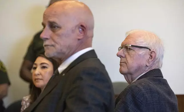 An Orange County Superior Court jury found Orange County Superior Court Judge Jeffrey Ferguson, right, guilty of second-degree murder in the 2023 shooting death of his wife Sheryl Ferguson, Tuesday, April 22, 2025, in Santa Ana, Calif. His attorney's Cameron Talley, is center, and Frances Prizzia, is left. (Mindy Schauer/The Orange County Register via AP, Pool)