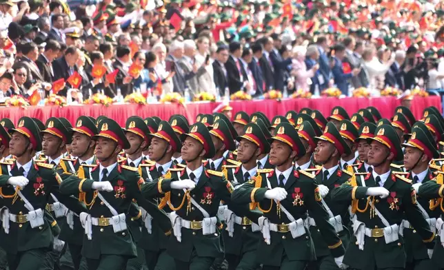 Vietnamese troops march during a parade to commemorate the 50th anniversary of the end of the Vietnam War in Ho Chi Minh City, Vietnam Wednesday, April 30, 2025. (AP Photo/Hau Dinh)