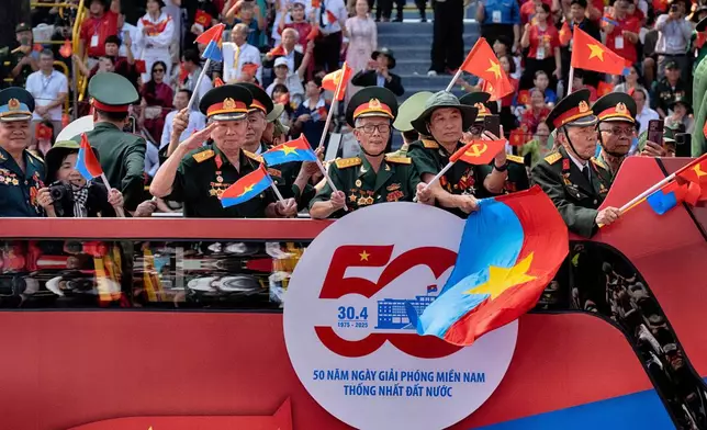 Vietnamese veteran soldiers take part in a parade during the 50th anniversary celebration of the end of the Vietnam War Wednesday, April 30, 2025, in Ho Chi Minh City, Vietnam. (AP Photo/Richard Vogel)