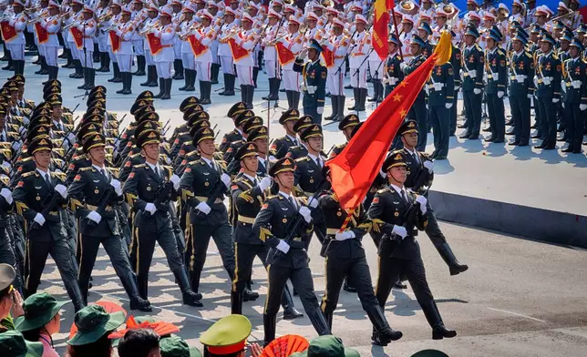 Chinese soldiers participate in a parade during the celebration for the 50th anniversary of the end of the Vietnam War on Wednesday, April 30, 2025, in Ho Chi Minh City, Vietnam. (AP Photo/Richard Vogel)