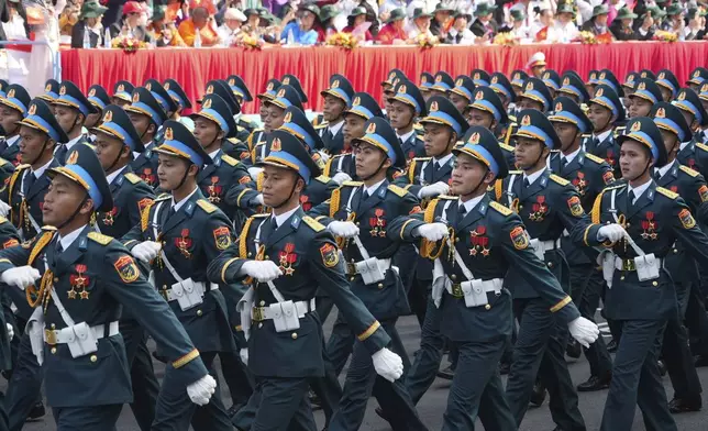 Vietnamese troops march during a parade to commemorate the 50th anniversary of the end of the Vietnam War in Ho Chi Minh City, Vietnam Wednesday, April 30, 2025. (AP Photo/Hau Dinh)