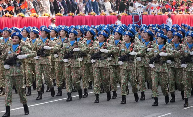 Vietnamese troops march during a parade to commemorate the 50th anniversary of the end of the Vietnam War in Ho Chi Minh City, Vietnam Wednesday, April 30, 2025. (AP Photo/Hau Dinh)