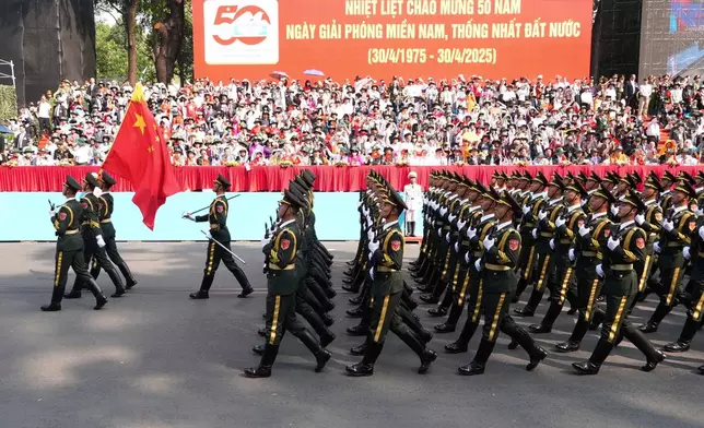 Chinese troops march during a parade to commemorate the 50th anniversary of the end of the Vietnam War in Ho Chi Minh City Wednesday, April 30, 2025. (AP Photo/Hau Dinh)