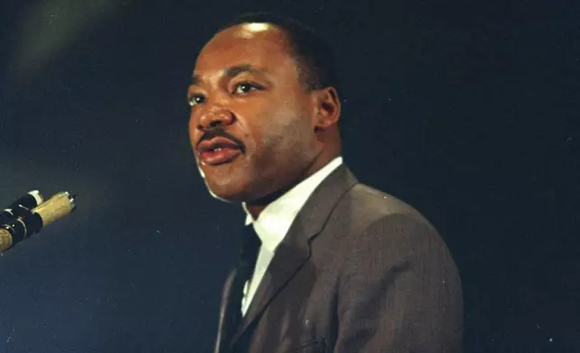 FILE - Dr. Martin Luther King speaks March 25, 1967 at the Chicago peace march. (AP Photo/Chick Harrity, File)
