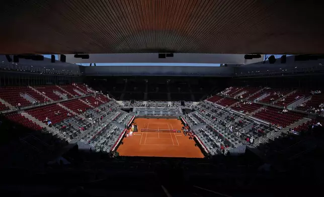 The Madrid Open tennis tournament venue is empty during a general blackout in Madrid, Monday, April 28, 2025. (AP Photo/Manu Fernandez)