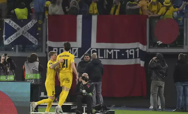 FILE - Glimt's Andreas Helmersen celebrates after scoring during the Europe League quarter final second leg match between Lazio and Bodo Glimt in Rome, Italy, Thursday, April 17, 2025. (AP Photo/Alessandra Tarantino, File)