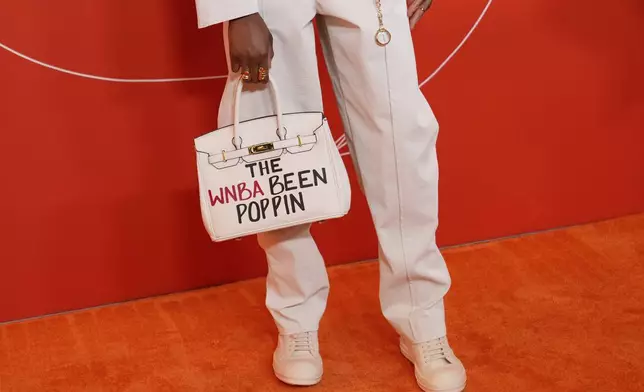 NC State's Saniya Rivers poses before the WNBA basketball draft, Monday, April 14, 2025, in New York. (AP Photo/Pamela Smith)