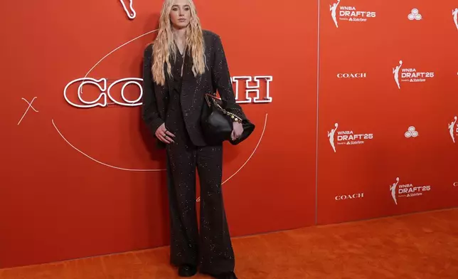 UConn's Paige Bueckers poses before the WNBA basketball draft, Monday, April 14, 2025, in New York. (AP Photo/Pamela Smith)
