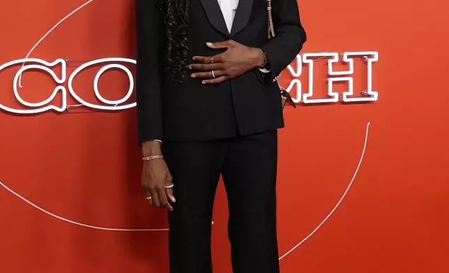 Dominique Malonga poses before the WNBA basketball draft, Monday, April 14, 2025, in New York. (AP Photo/Pamela Smith)