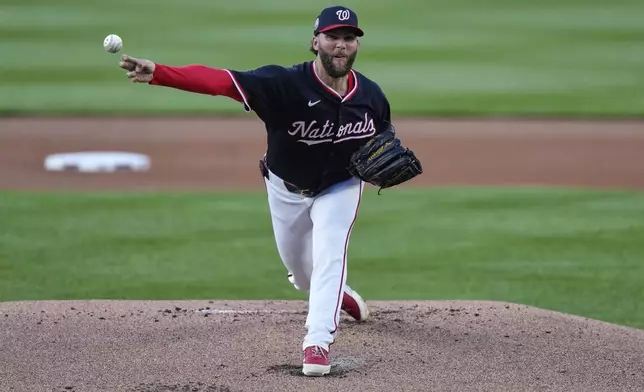 Washington Nationals starting pitcher Trevor Williams delivers during the first inning of a baseball game against the Baltimore Orioles, Wednesday, April 23, 2025, in Washington. (AP Photo/Stephanie Scarbrough)