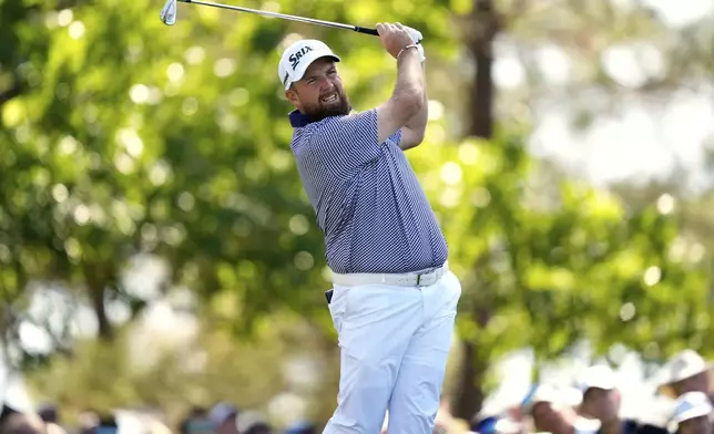 Shane Lowry, of Ireland, watches his tee shot on the fourth hole during the second round at the Masters golf tournament, Friday, April 11, 2025, in Augusta, Ga. (AP Photo/Julia Demaree Nikhinson)
