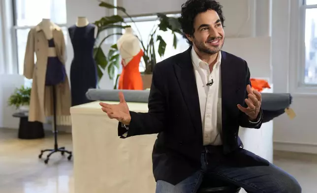Designer Zac Posen talks about his new clothing line at the Gap corporate office on Tuesday, March 25, 2025, in New York. (Photo by Charles Sykes/Invision/AP)