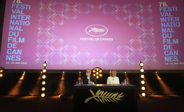 Cannes film festival president Iris Knobloch, right, and Cannes film festival delegate general Thierry Fremaux attend a press conference to announce the International Cannes film festival line up for the upcoming 78th edition of the Cannes Film Festival, Thursday, April 10, 2025 in Paris. (AP Photo/Michel Euler)