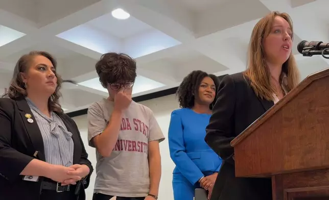 Madalyn Propst, a 19-year-old freshman at Florida State University, speaks at a news conference in the state capitol in Tallahassee, Fla. alongside Democratic lawmakers on Tuesday, April 22, 2025. (AP Photo/Kate Payne)
