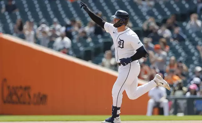 CORRECTS TO EIGHTH INNING, NOT NINTH - Detroit Tigers' Dillon Dingler rounds the bases after hitting a 2-run home run during the eighth inning of a baseball game against the San Diego Padres, Wednesday, April 23, 2025, in Detroit. (AP Photo/Duane Burleson)
