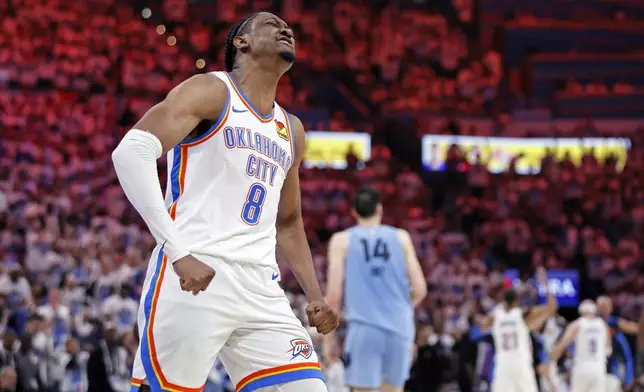 Oklahoma City Thunder forward Jalen Williams (8) reacts after a dunk during the first half in Game 1 of an NBA first-round playoff series against the Memphis Grizzlies, Sunday, April 20, 2025, in Oklahoma City. (AP Photo/Nate Billings)