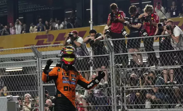 McLaren driver Oscar Piastri of Australia celebrates after winning the Formula One Saudi Arabian Grand Prix at the Jeddah Corniche Circuit in Jeddah, Saudi Arabia, Sunday, April 20, 2025. (AP Photo/Altaf Qadri)