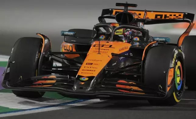 McLaren driver Oscar Piastri of Australia steers his car during the Formula One Saudi Arabian Grand Prix at the Jeddah Corniche Circuit in Jeddah, Saudi Arabia, Sunday, April 20, 2025. (AP Photo/Darko Bandic)