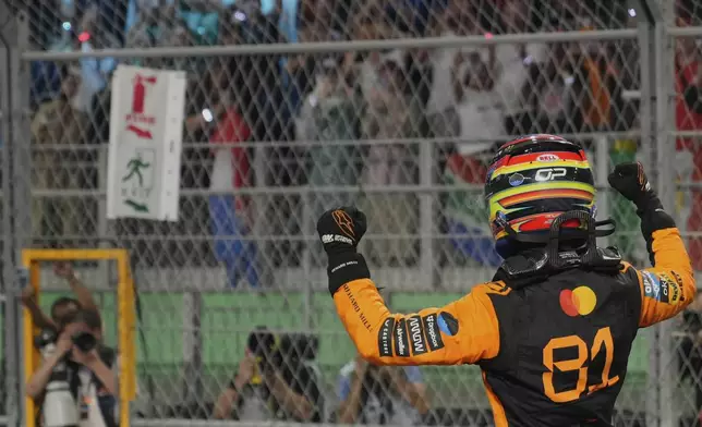 McLaren driver Oscar Piastri of Australia celebrates after winning the Formula One Saudi Arabian Grand Prix at the Jeddah Corniche Circuit in Jeddah, Saudi Arabia, Sunday, April 20, 2025. (AP Photo/Darko Bandic)