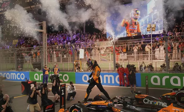 McLaren driver Oscar Piastri of Australia celebrates after winning the Formula One Saudi Arabian Grand Prix at the Jeddah Corniche Circuit in Jeddah, Saudi Arabia, Sunday, April 20, 2025. (AP Photo/Darko Bandic)