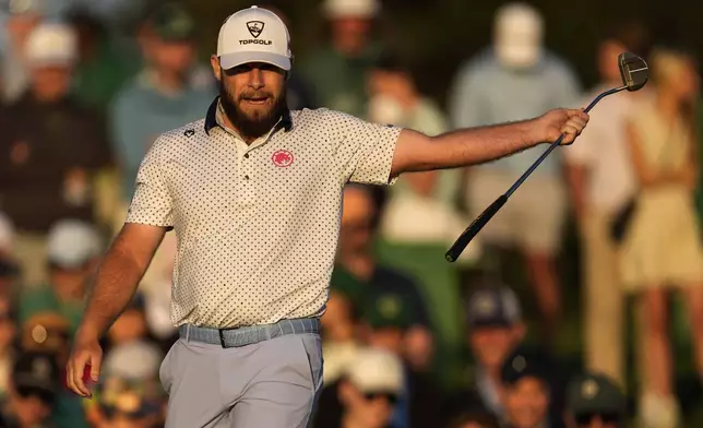 Tyrrell Hatton, of England, reacts to a putt on the 18th hole during the second round at the Masters golf tournament, Friday, April 11, 2025, in Augusta, Ga. (AP Photo/Ashley Landis)