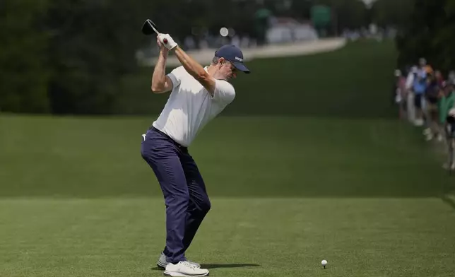 Justin Rose hits his tee shot on the 18th hole during the second round at the Masters golf tournament, Friday, April 11, 2025, in Augusta, Ga. (AP Photo/David J. Phillip)