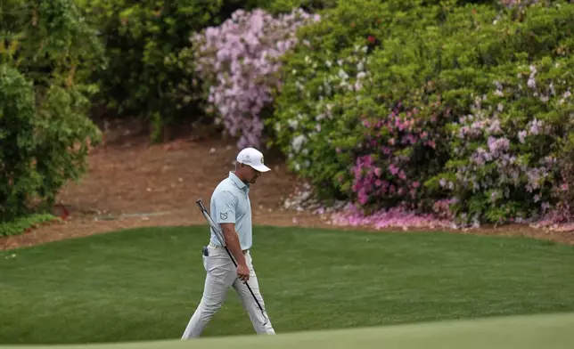 Bryson DeChambeau walks to the green on the 13th hole during the second round at the Masters golf tournament, Friday, April 11, 2025, in Augusta, Ga. (AP Photo/Julia Demaree Nikhinson)