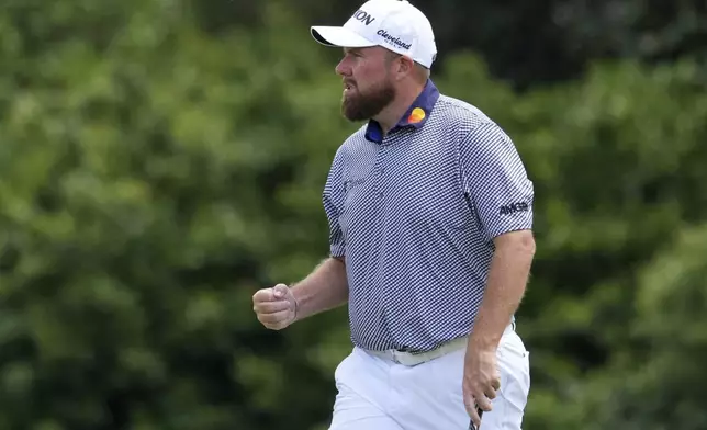 Shane Lowry, of Ireland, celebrates after a birdie on the 11th hole during the second round at the Masters golf tournament, Friday, April 11, 2025, in Augusta, Ga. (AP Photo/Matt Slocum)