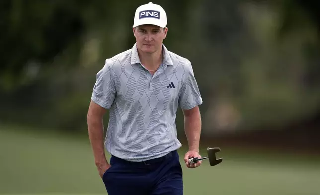 Matt McCarty walks to the green on the 18th hole during the second round at the Masters golf tournament, Friday, April 11, 2025, in Augusta, Ga. (AP Photo/George Walker IV)