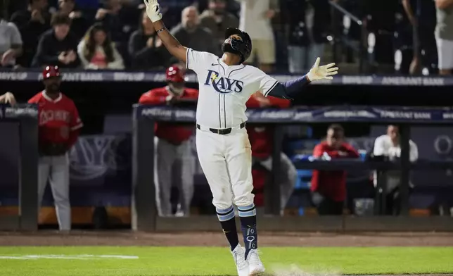 Tampa Bay Rays' Junior Caminero reacts after his solo home run off Los Angeles Angels pitcher Ben Joyce during the seventh inning of a baseball game Tuesday, April 8, 2025, in Tampa, Fla. (AP Photo/Chris O'Meara)