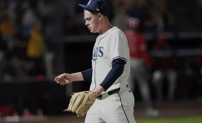 Tampa Bay Rays pitcher Pete Fairbanks reacts after giving up a go-ahead run to the Los Angeles Angels during the ninth inning of a baseball game Tuesday, April 8, 2025, in Tampa, Fla. (AP Photo/Chris O'Meara)