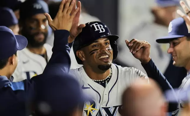 Tampa Bay Rays' Christopher Morel celebrates after scoring on an RBi triple by Kameron Misner off Los Angeles Angels pitcher Ben Joyce during the seventh inning of a baseball game Tuesday, April 8, 2025, in Tampa, Fla. (AP Photo/Chris O'Meara)